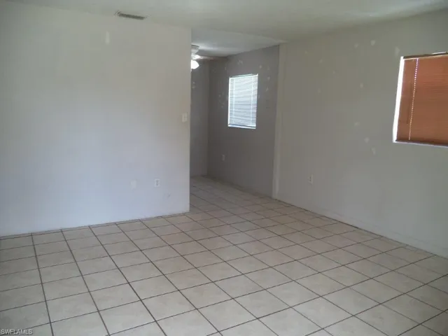 Spare room with visible vents