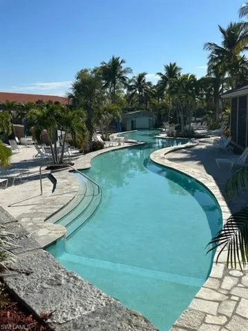 View of swimming pool with a patio