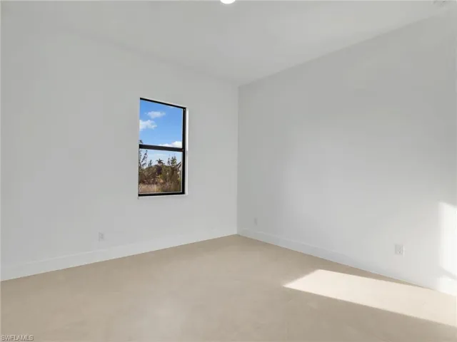 Empty room with baseboards
