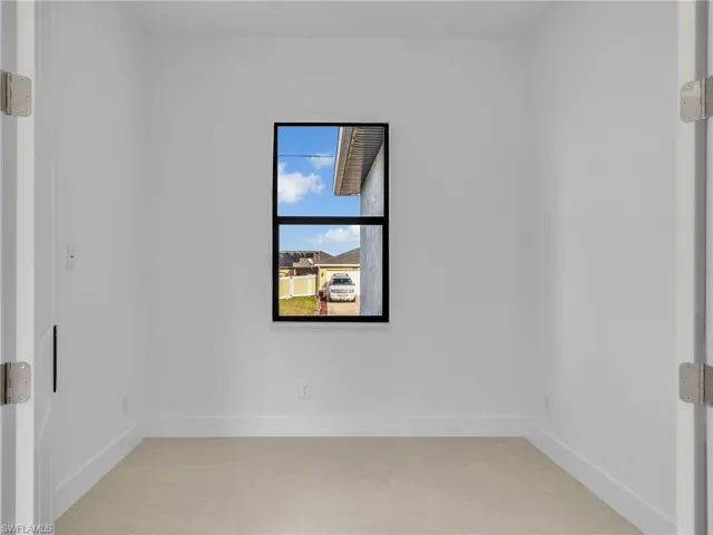 Spare room with baseboards
