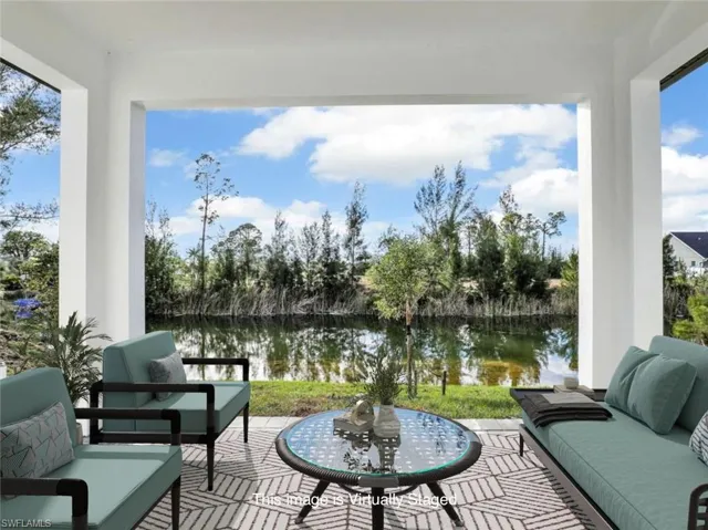 View of patio featuring an outdoor living space and a water view