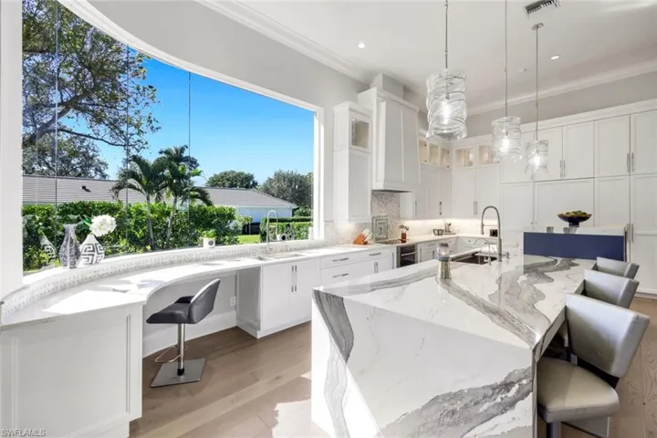 12924 Bald Cypress Ln, Naples, Florida 34119