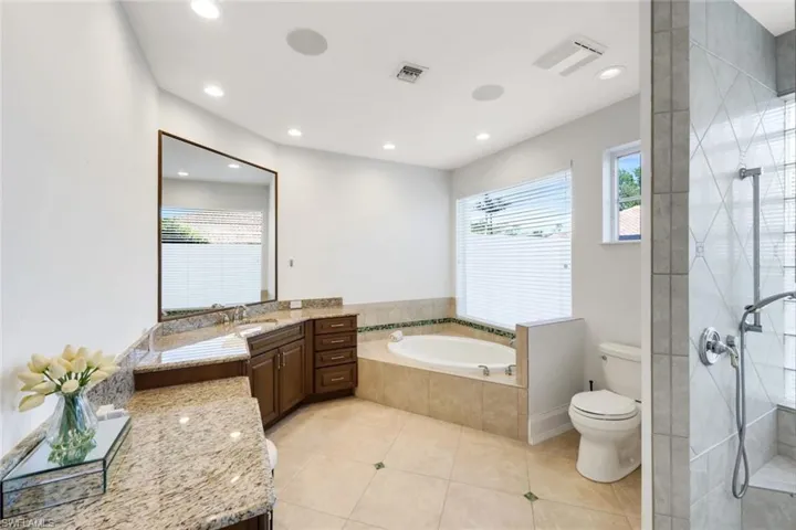 12924 Bald Cypress Ln, Naples, Florida 34119