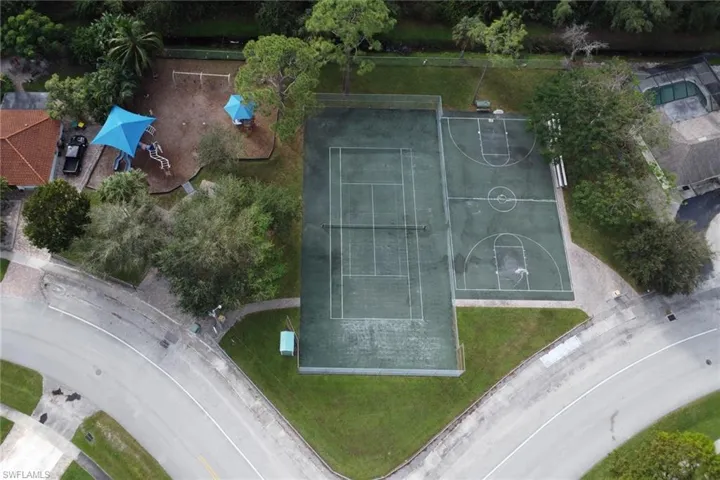 Birds eye view of County maintained Community Park with playground and basketball courts