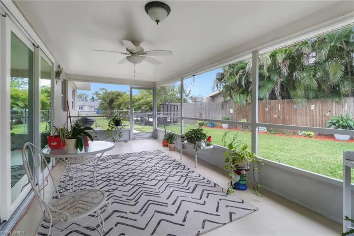 Patio with plenty of natural light and ceiling fan