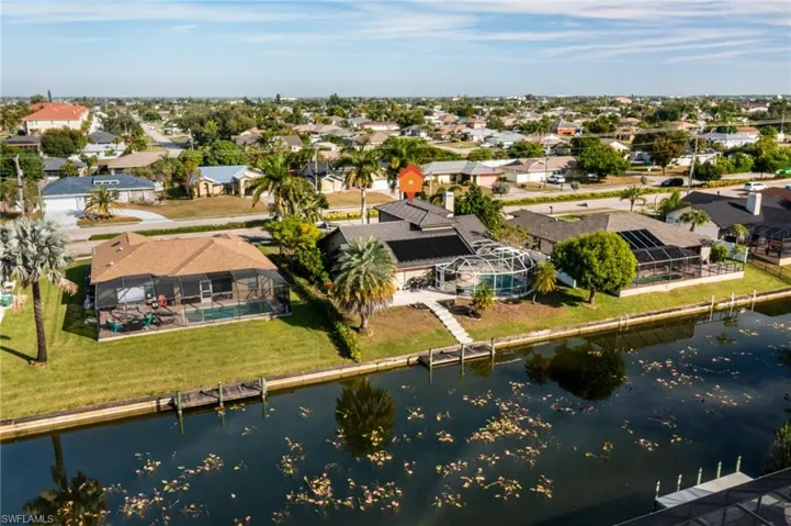 Aerial view of residential area with a nearby body of water