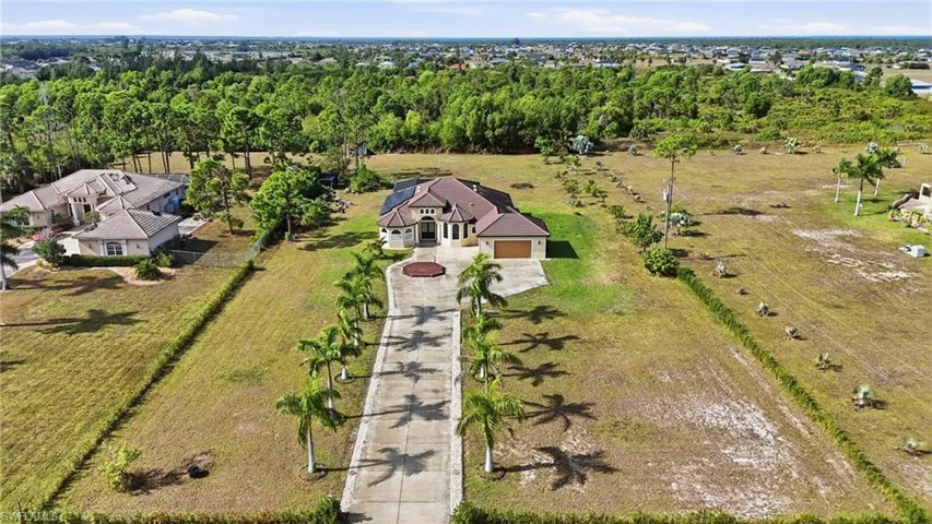 Aerial view of property and surrounding area