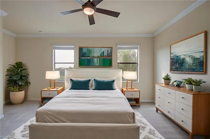 Bedroom featuring crown molding, ceiling fan, and multiple windows