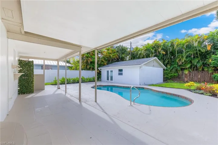 View of pool featuring a patio and a fenced backyard