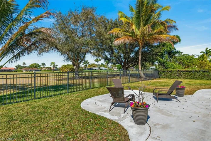 Fenced backyard featuring a patio