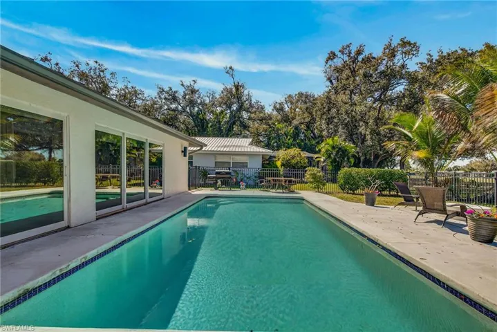 View of pool featuring patio surround