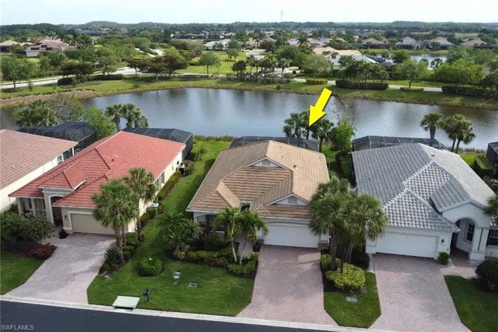 Aerial view of residential area with a large body of water