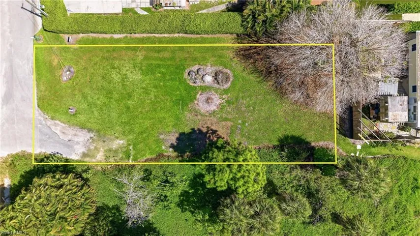 Aerial overview of property's location with property parcel outlined