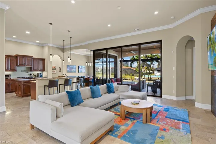 Living room featuring crown molding