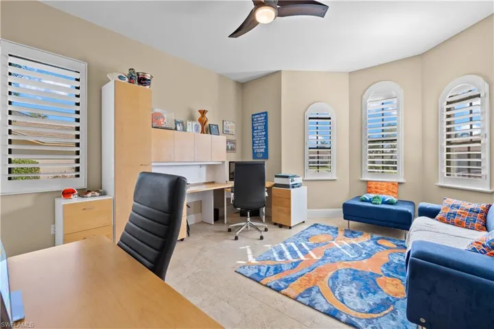 Home office with ceiling fan