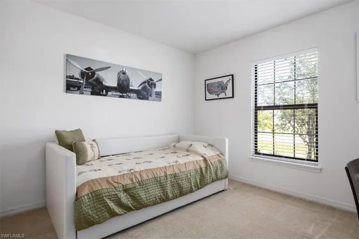 Bedroom with carpet flooring