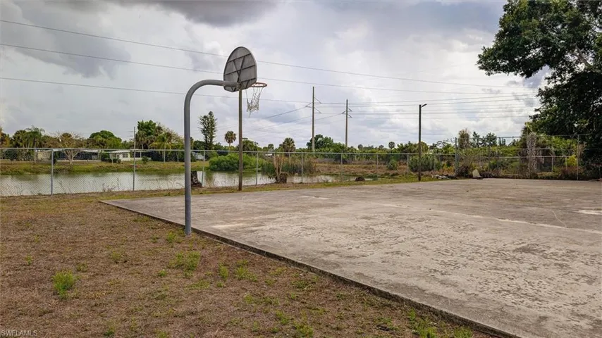 View of basketball court featuring community basketball court