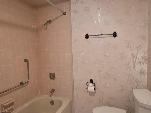 Primary bathroom has handicap-accessible handrails.