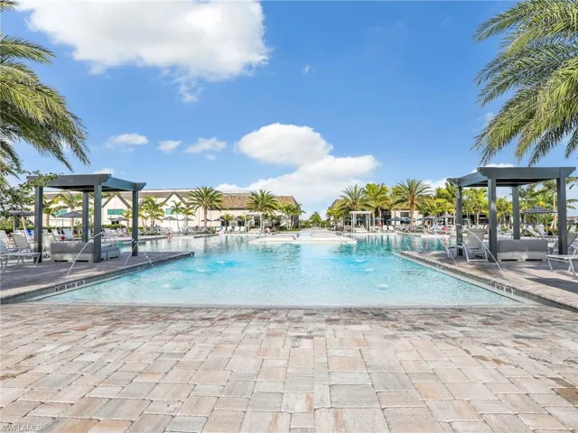 Community pool with a gazebo and a patio