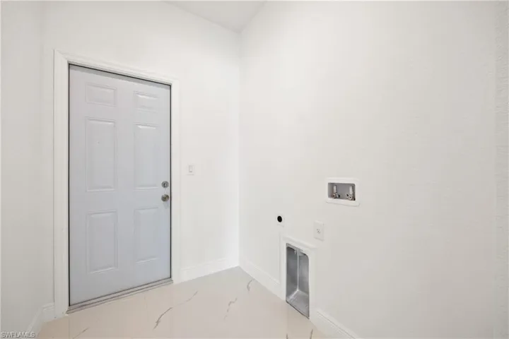 Laundry area with hookup for an electric dryer and washer hookup