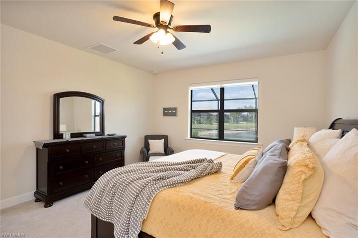 Primary bedroom shows view to spectacular outdoor area