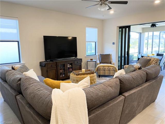 Great room showing zero corner sliders to outside