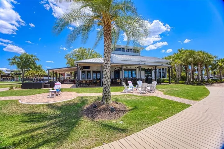 Back of house featuring a patio and a yard