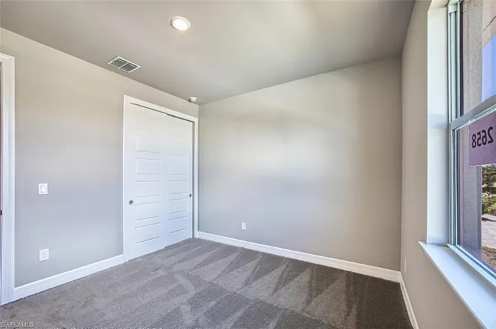 Spare room featuring carpet floors