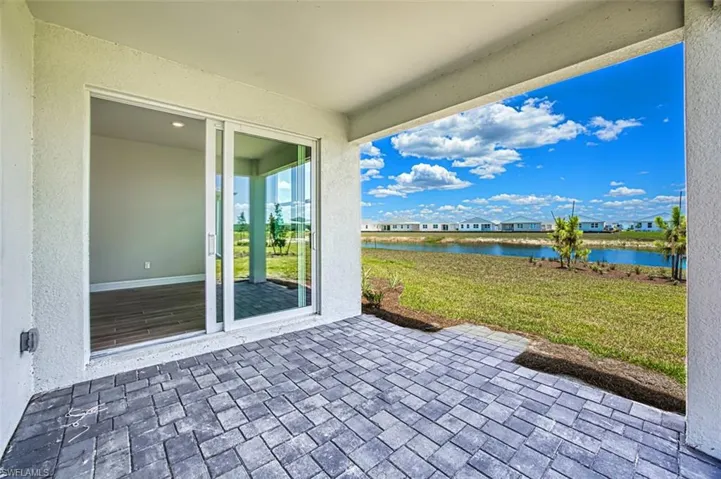 View of patio / terrace featuring a water view