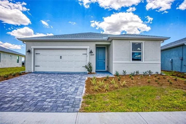 View of front of property with a garage