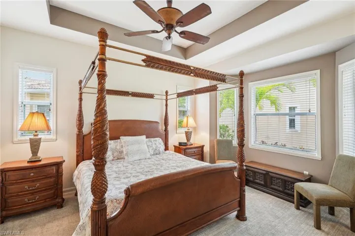 Oversized Primary Bedroom with a Tray ceiling