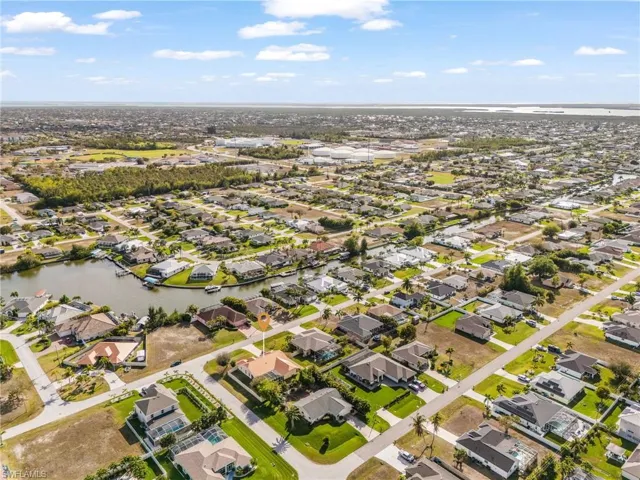 Aerial view of residential area with a nearby body of water