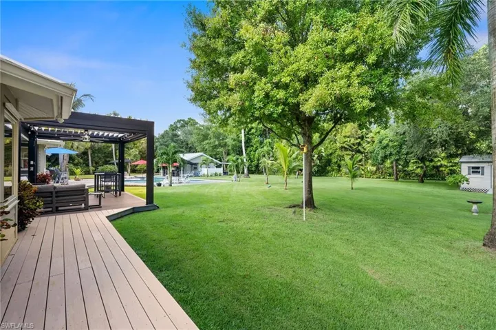 Decking leading from outdoor spa off of primary suite