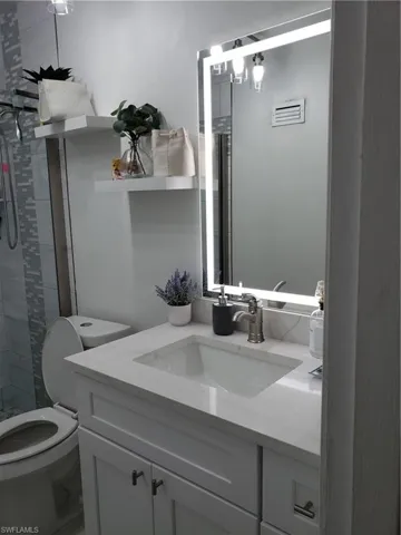 Vanity with lights in the mirror