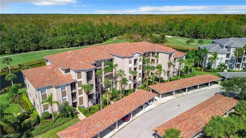 Bird's eye view of apartment complex / building and a golf club