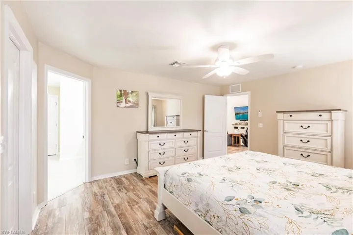 Bedroom featuring ceiling fan and light wood-style floors
