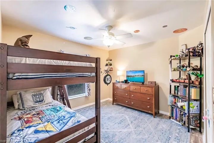 Bedroom 3 with ceiling fan