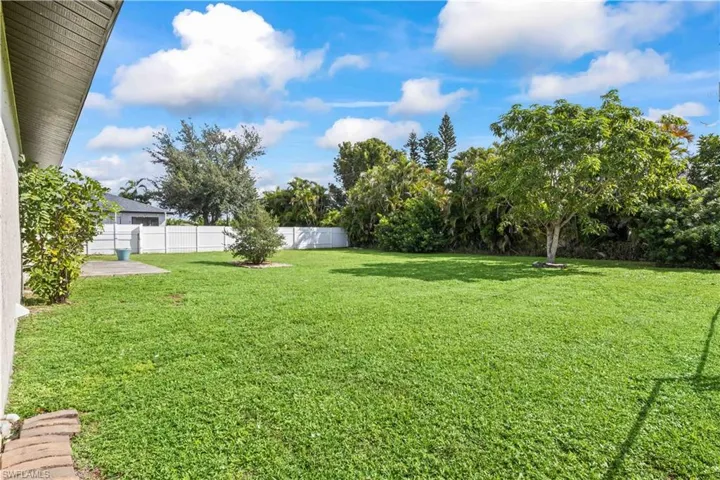 View of fenced backyard