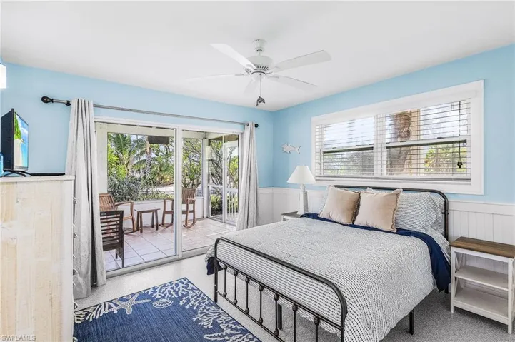 The third bedroom is a private suite for your guest with their own sliding glass doors to their private screen porch.