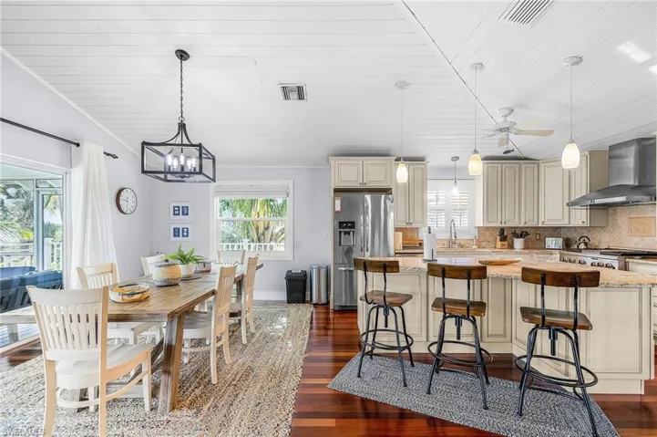 The dining area has lovely views of Charlotte Harbor and conveniently located to the chef's kitchen!