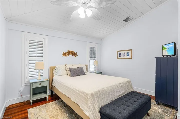 Guest Bedroom Ensuite bath has wood vaulted ceilings and solid mahogany floors.