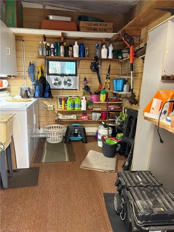 Storage room with washing machine and dryer