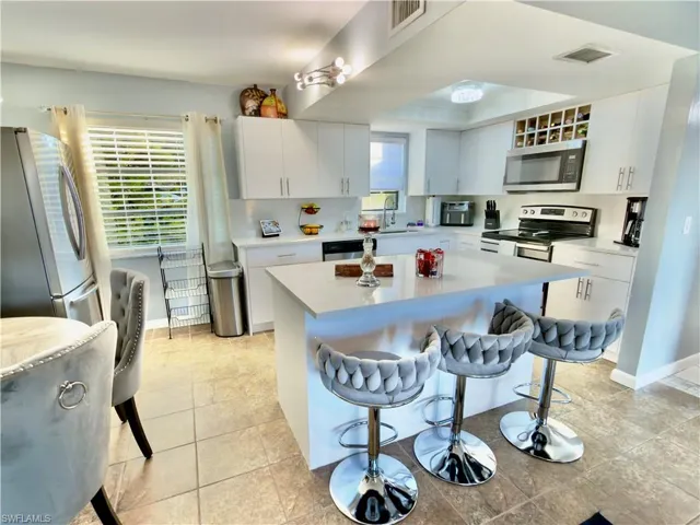 1104 SE 8th  ST, Cape Coral, FL 33990