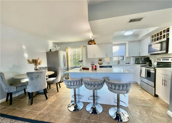 1104 SE 8th  ST, Cape Coral, FL 33990