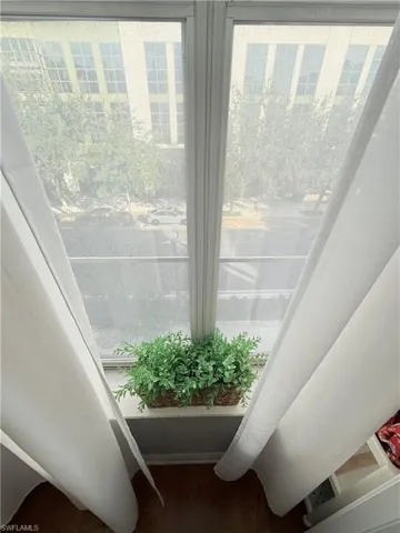 Room details with hardwood / wood-style flooring