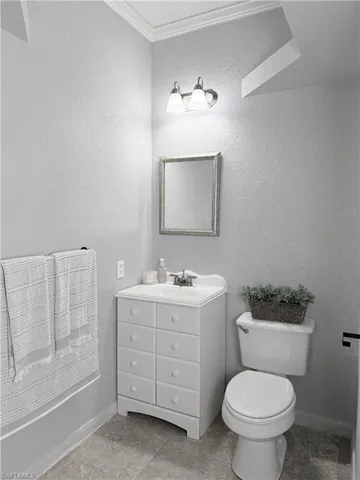 Bathroom featuring toilet and vanity
