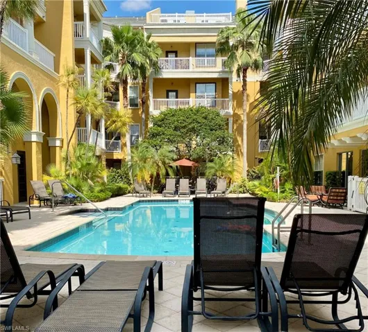 View of swimming pool featuring a patio