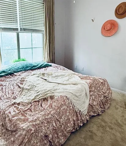 Bedroom featuring carpet