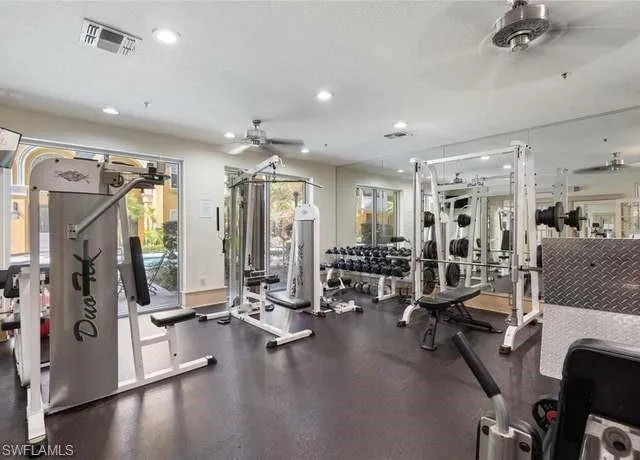 Workout area featuring ceiling fan
