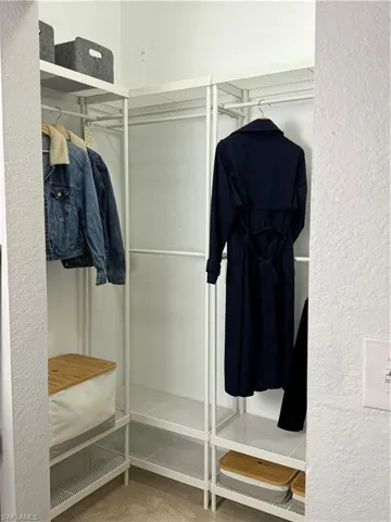 Spacious closet with carpet floors , second bedroom .